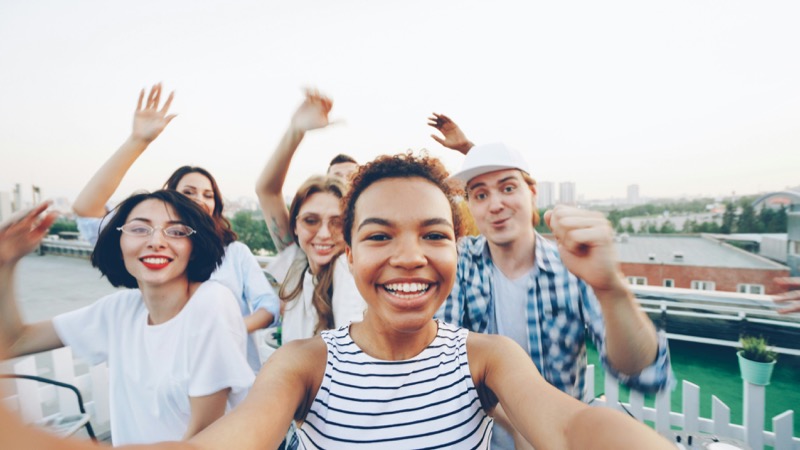 A group celebrating together on a rooftop