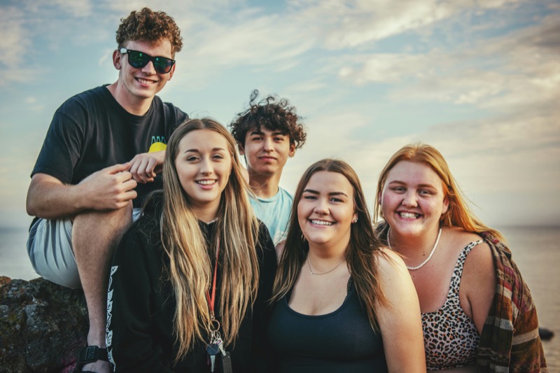 Young people enjoying time together at the beach